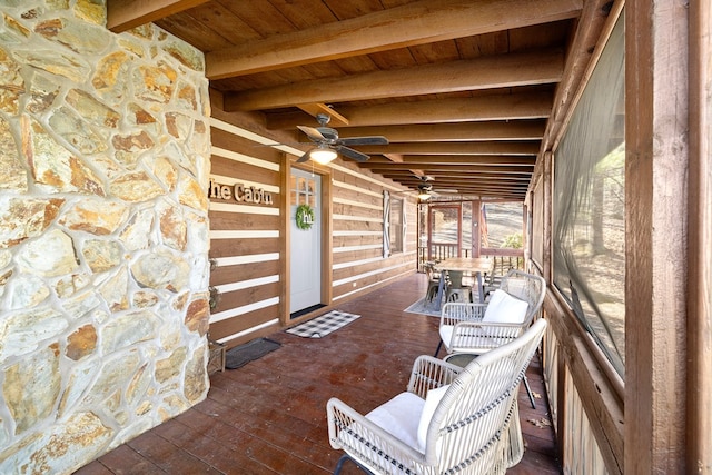 view of patio featuring ceiling fan