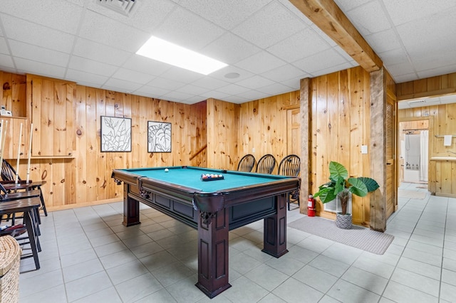 rec room featuring a paneled ceiling, wooden walls, and billiards