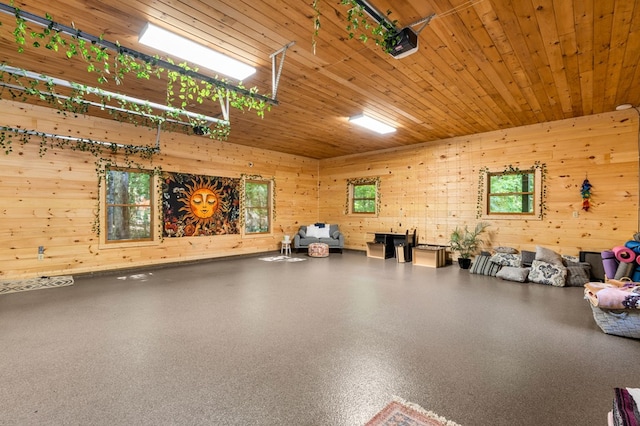 garage featuring wood ceiling, a garage door opener, and wood walls