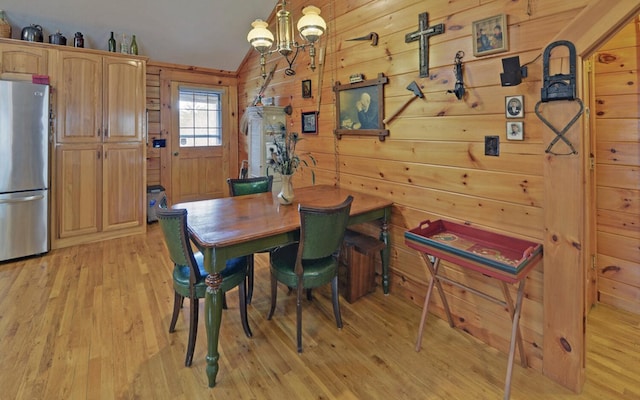530 Bear Paw Church Rd, Murphy, NC 28906 - dining room with light wood-style floors, lofted ceiling, a chandelier, and wood walls