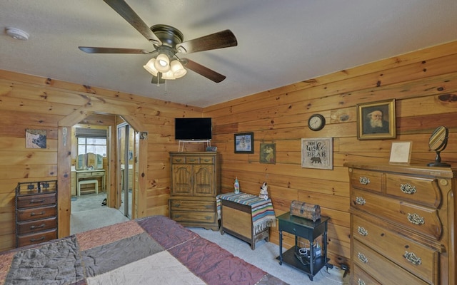 530 Bear Paw Church Rd, Murphy, NC 28906 - bedroom featuring arched walkways, wood walls, and light colored carpet