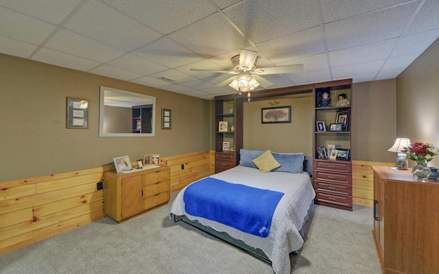 530 Bear Paw Church Rd, Murphy, NC 28906 - bedroom featuring a paneled ceiling, wood walls, a ceiling fan, and light colored carpet