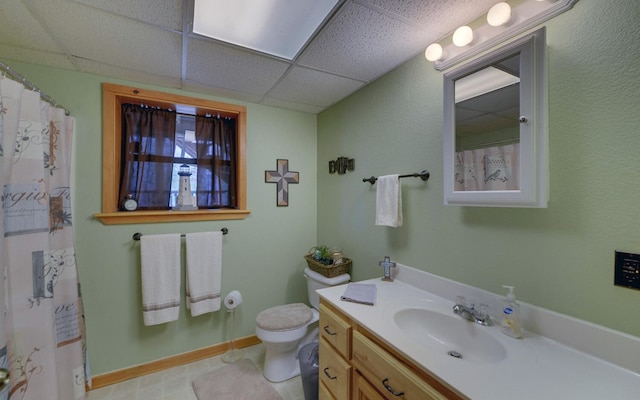 530 Bear Paw Church Rd, Murphy, NC 28906 - full bathroom featuring baseboards, a drop ceiling, vanity, and toilet