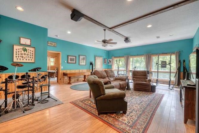 bedroom featuring wood ceiling, lofted ceiling, wood-type flooring, and ceiling fan