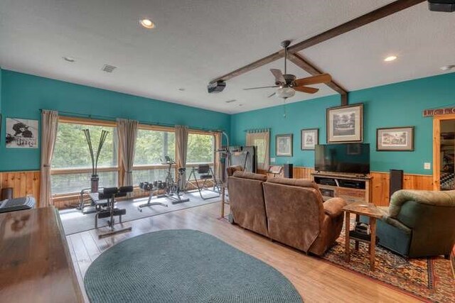 bedroom with wooden ceiling, multiple windows, lofted ceiling, and light wood-type flooring