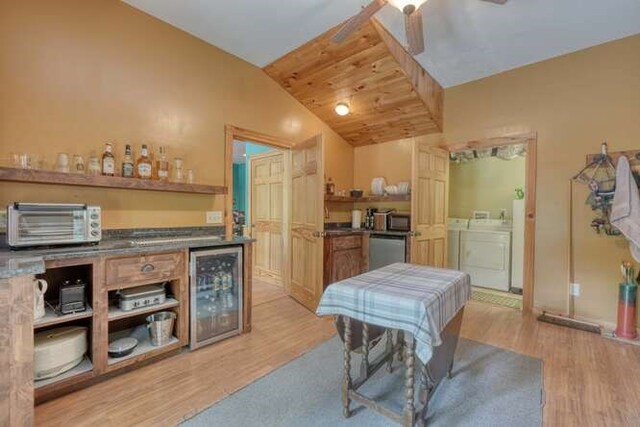 living room featuring light wood-type flooring and ceiling fan