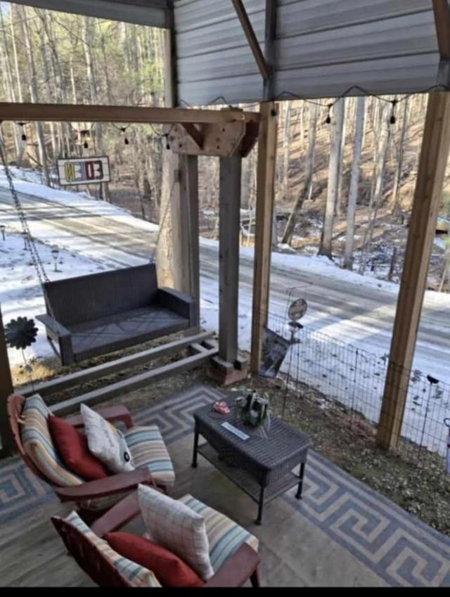 view of snow covered patio