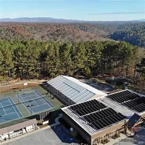 drone / aerial view with a view of trees