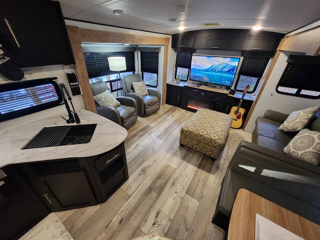 home theater room with light wood-style floors