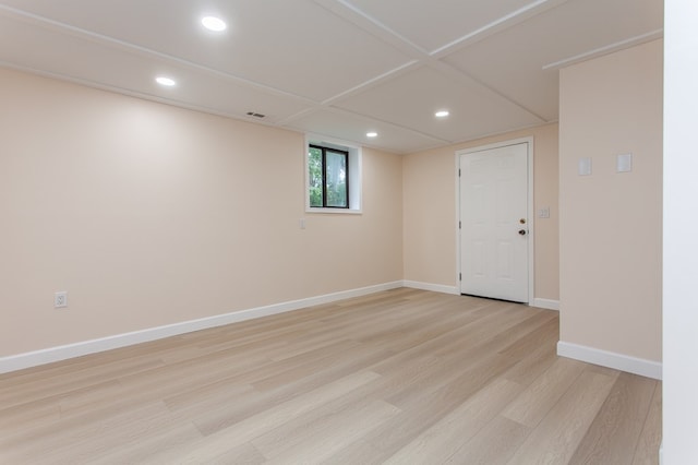 basement featuring light hardwood / wood-style floors