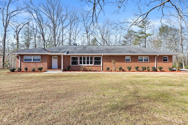 single story home with a front yard