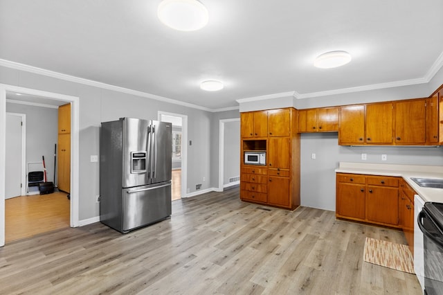 kitchen with range, stainless steel refrigerator with ice dispenser, light hardwood / wood-style floors, crown molding, and white microwave