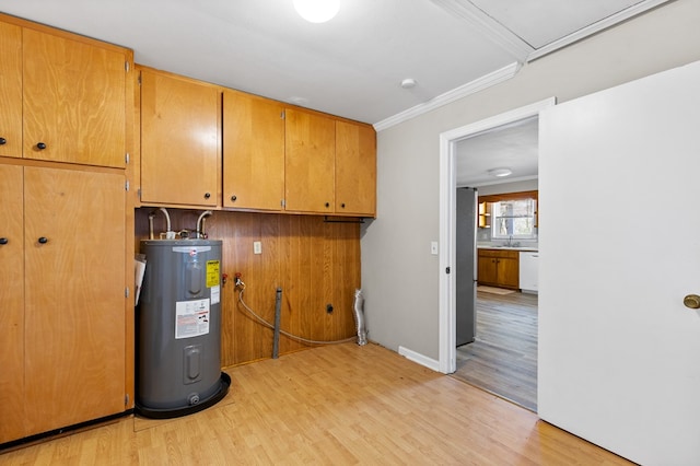 utility room featuring sink and water heater