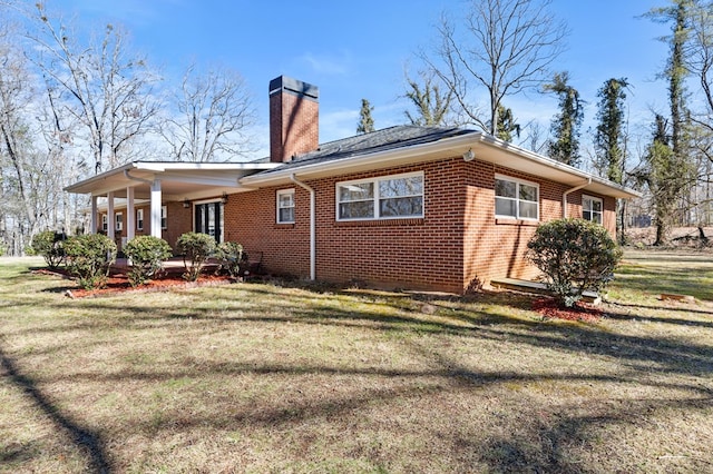 exterior space featuring a lawn and a porch