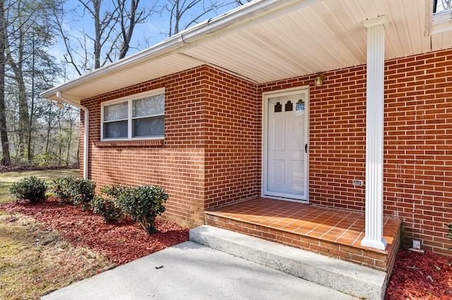 entrance to property with a porch