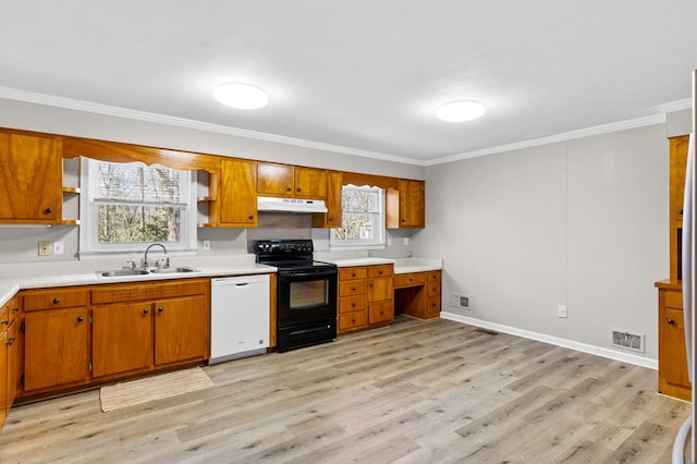 kitchen featuring sink, dishwasher, electric range, and light wood-type flooring