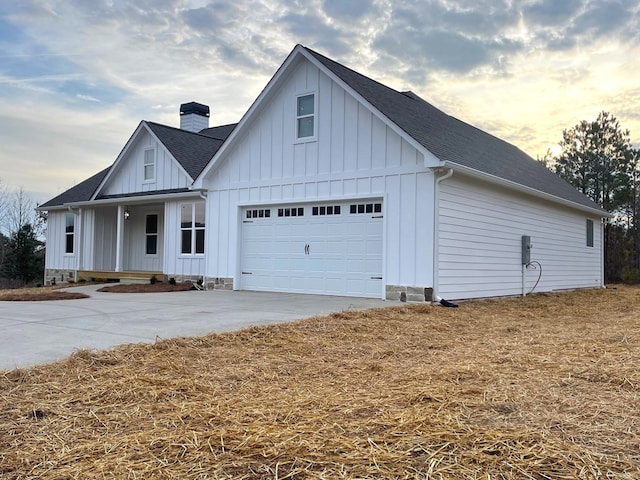 modern farmhouse style home with a garage