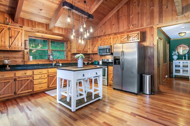 living room featuring beamed ceiling, rustic walls, high vaulted ceiling, and wooden ceiling