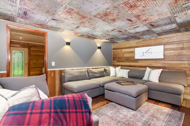 bathroom featuring wood ceiling, hardwood / wood-style floors, a bathing tub, vanity, and toilet