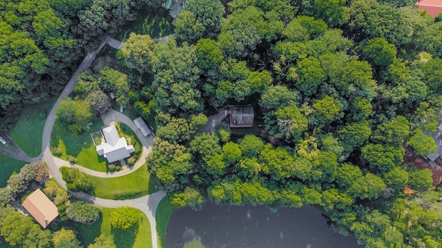 drone / aerial view with a view of trees