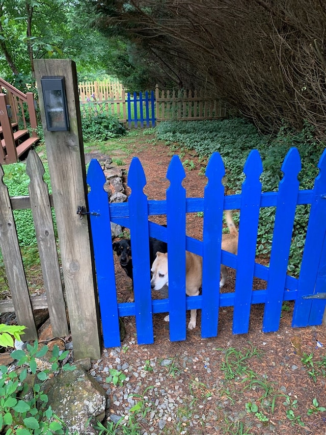 view of property's community with fence