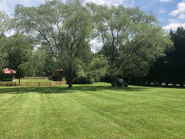view of yard with fence