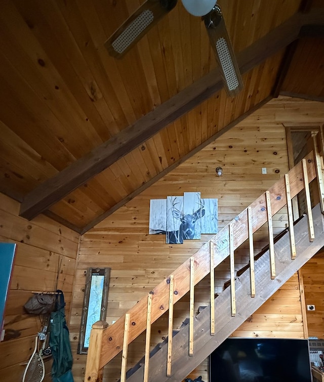 bonus room featuring wooden walls, wood ceiling, and vaulted ceiling with beams