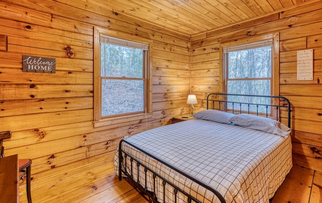 57 Coffee Pot Dr, Blue Ridge, GA 30513 - bedroom featuring hardwood / wood-style floors, wooden ceiling, and wood walls