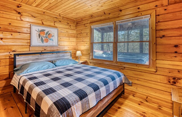 57 Coffee Pot Dr, Blue Ridge, GA 30513 - bedroom with hardwood / wood-style flooring, wood ceiling, and wooden walls
