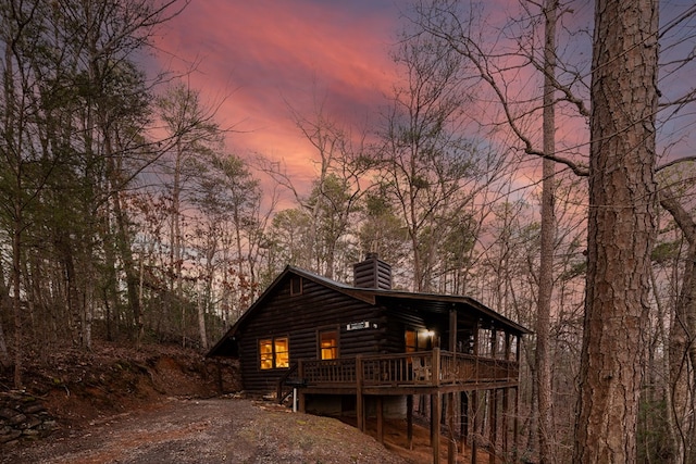 57 Coffee Pot Dr, Blue Ridge, GA 30513 - view of front of property with a chimney, a deck, and log exterior