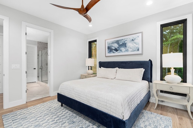 bedroom with hardwood / wood-style floors and ceiling fan