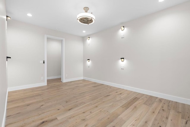 spare room featuring light hardwood / wood-style flooring