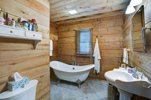 bathroom featuring wooden ceiling, wood walls, toilet, and a tub