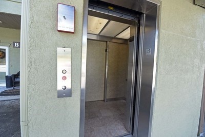 view of exterior entry with elevator