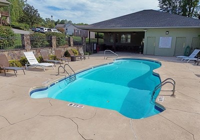 view of pool featuring a patio area