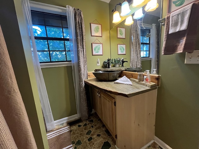 149 Poormans Trl, Murphy, NC 28906 - bathroom with vanity, a chandelier, and plenty of natural light