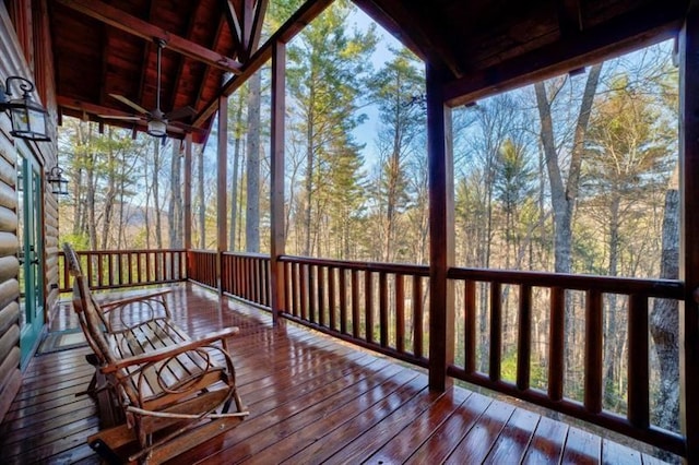 sunroom / solarium with beam ceiling