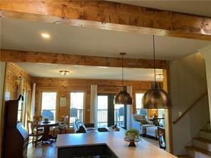 living room with beamed ceiling