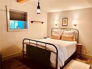 bedroom featuring dark wood-type flooring