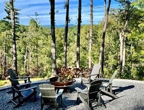 view of patio featuring an outdoor fire pit