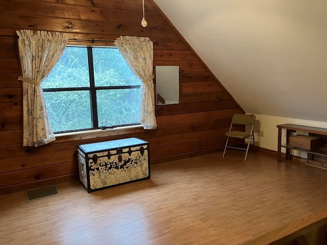 147 Holly Ridge Ln, Murphy, NC 28906 - bonus room featuring lofted ceiling, wooden walls, and light hardwood / wood-style floors