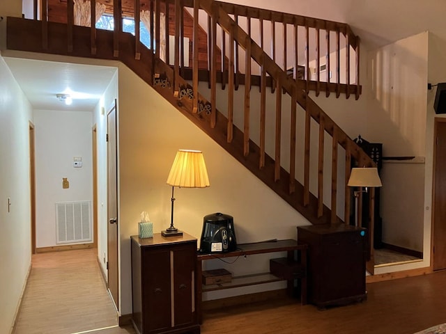 147 Holly Ridge Ln, Murphy, NC 28906 - stairs featuring wood-type flooring