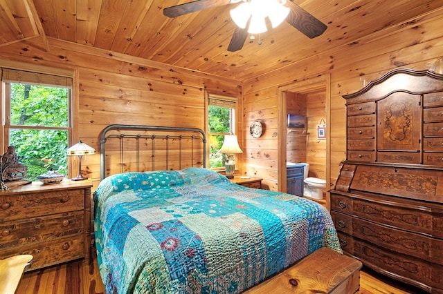 80 Stegall Mill Rdg, Ellijay, GA 30536 - bedroom with wood ceiling, wood walls, wood finished floors, ensuite bathroom, and ceiling fan