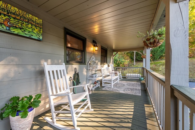 deck featuring covered porch