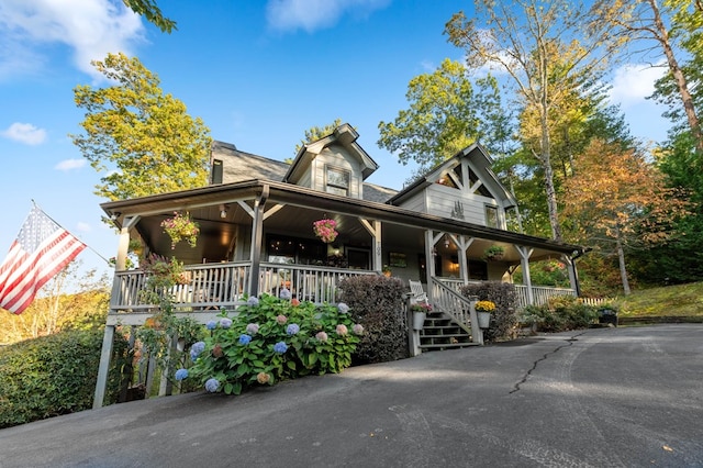 farmhouse inspired home featuring a porch