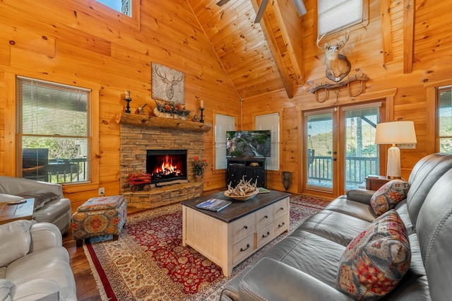 living room with a fireplace, wooden ceiling, wood-type flooring, high vaulted ceiling, and beam ceiling