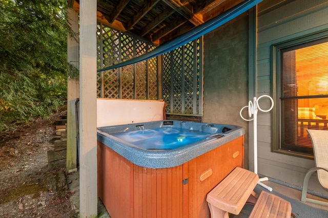 view of patio with a hot tub