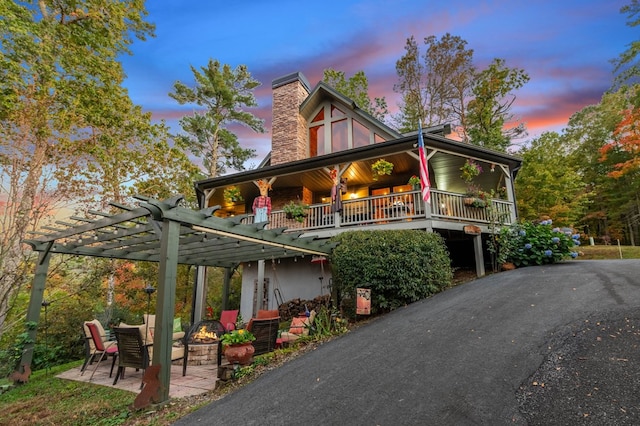 exterior space featuring a patio and a pergola