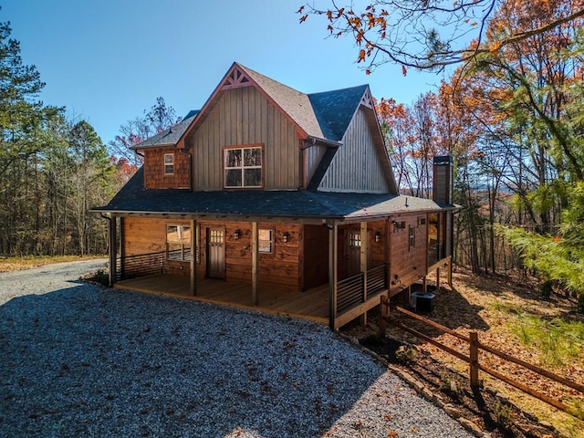 rear view of property featuring cooling unit