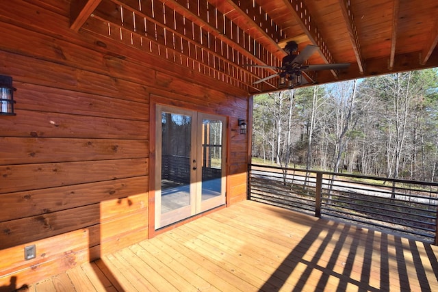 wooden deck featuring french doors and ceiling fan